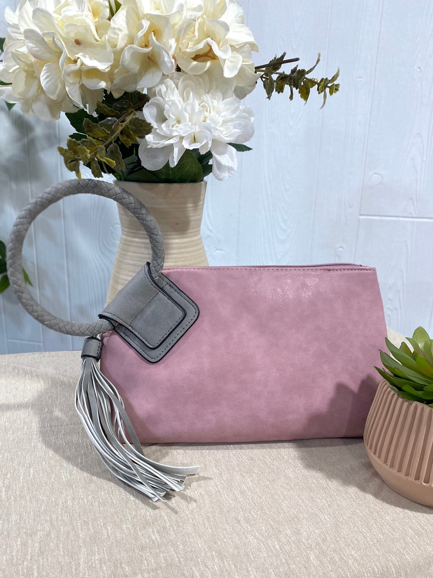 Cuff Handle Tassel Wristlet Clutch in Blush