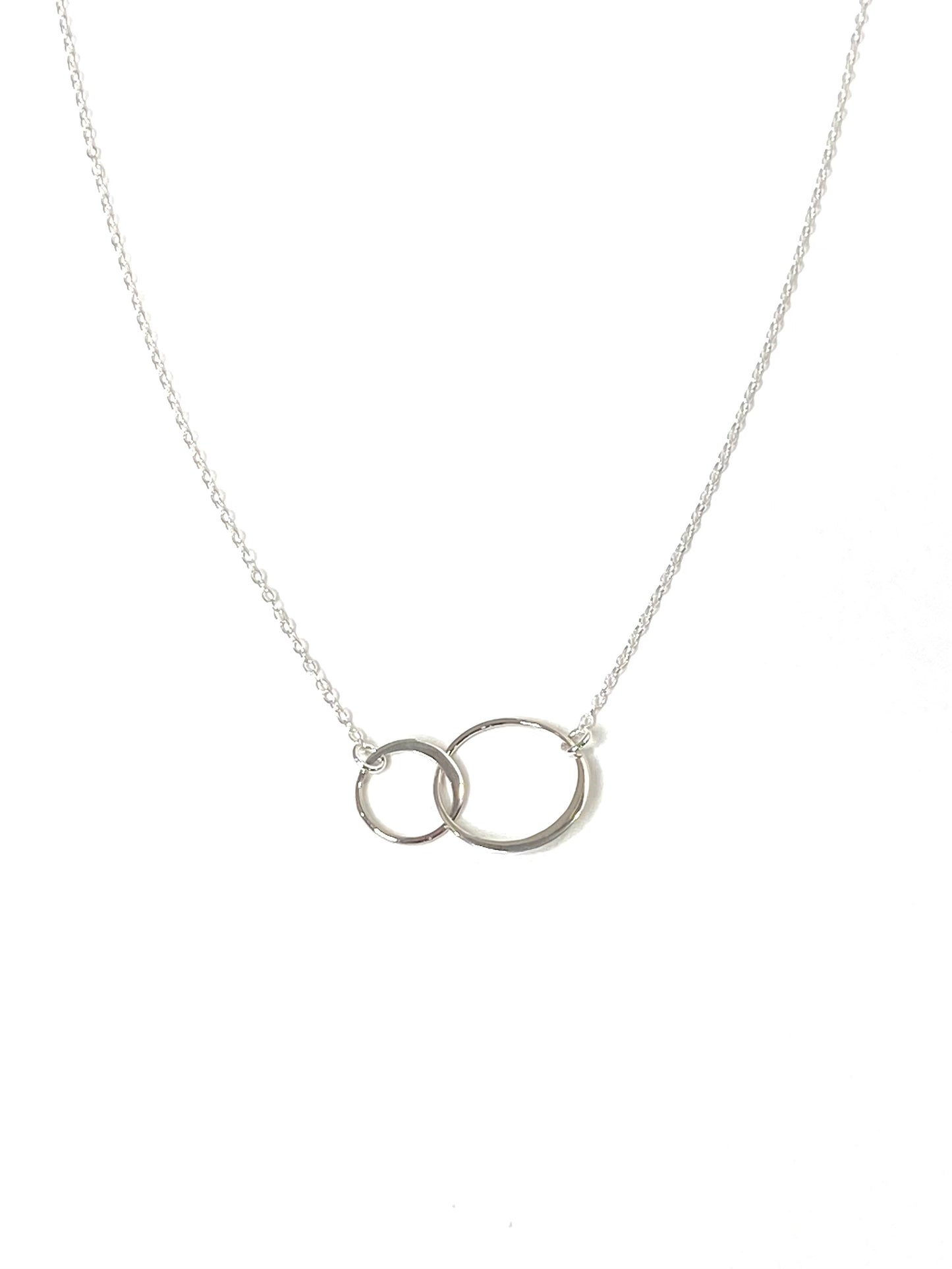 Two Intertwined Circle Sideways Necklace in Sterling Silver